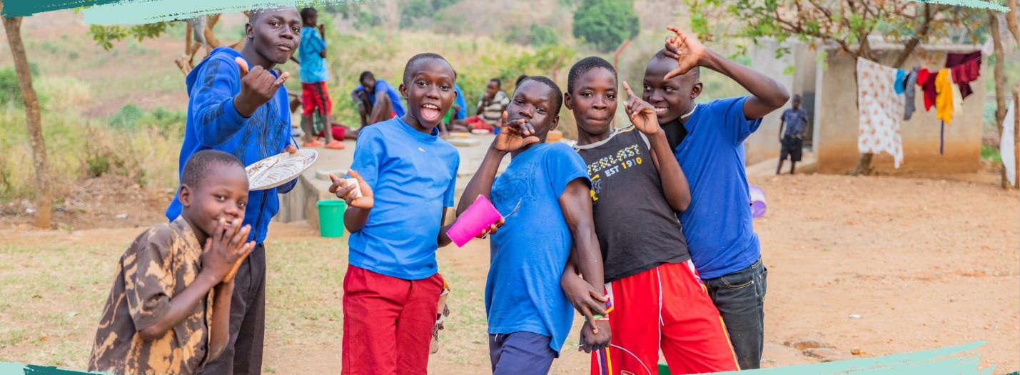 Smiling children in a community 127 Worldwide serves